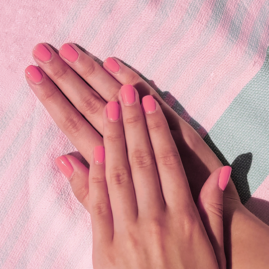 Hands with pink nails